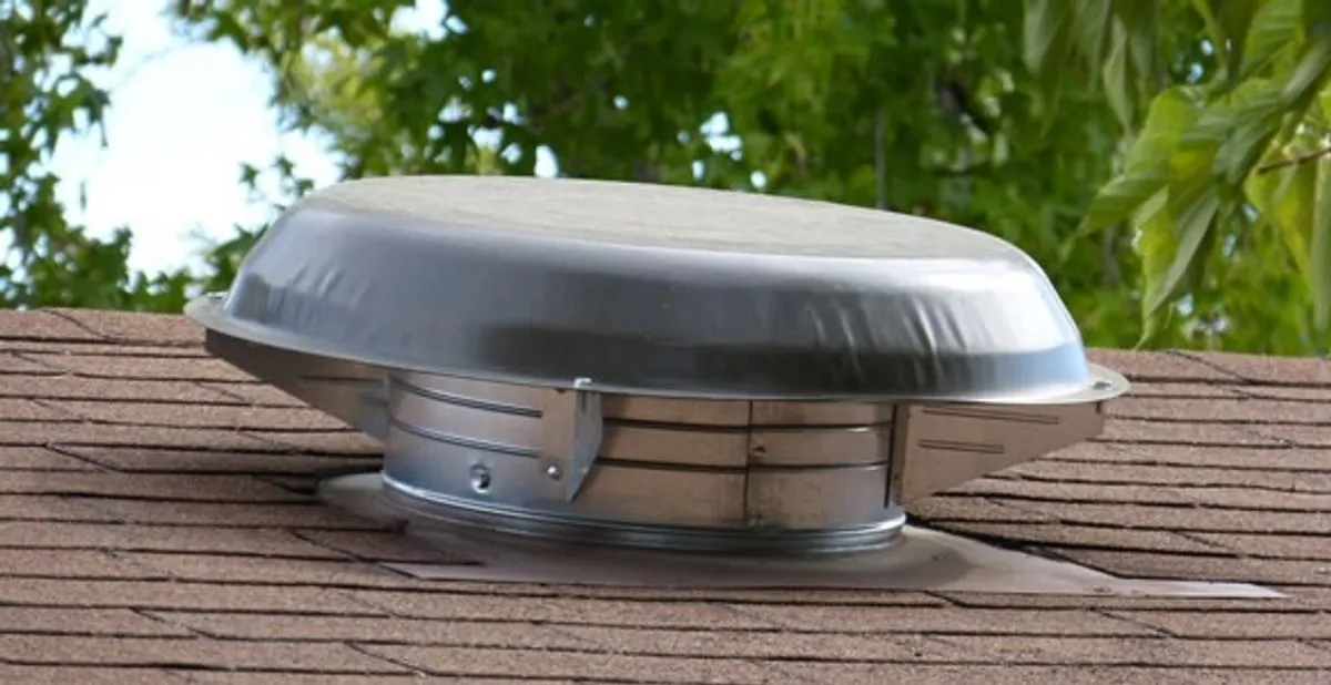 attic fan installation services with low-profile roof ventilation unit in Redding, CA