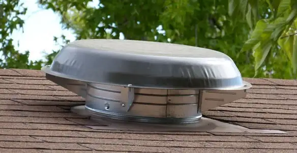 attic fan installation services with low-profile roof ventilation unit in Redding, CA