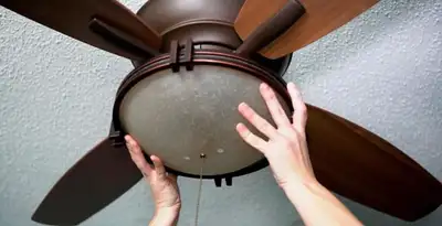 Ceiling fan repair and reinstallation on ceiling mount in Redding, CA