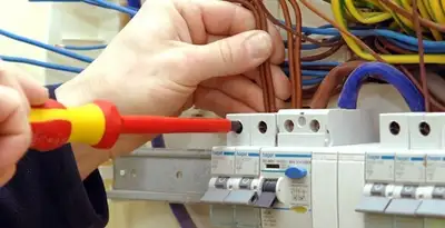 electrician services performing professional electrical panel wiring and connections in Redding, CA