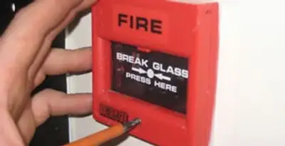 fire alarm installation service showing manual fire alarm pull station installed by licensed electricians in Redding, CA