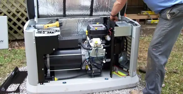 generator installation service showing technician connecting and configuring generator components in Redding, CA