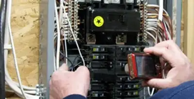 Home electrical inspection of circuit breaker panel by licensed electrician in Redding, CA