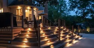 Residential electrician installing outdoor lighting for home safety in Redding, CA