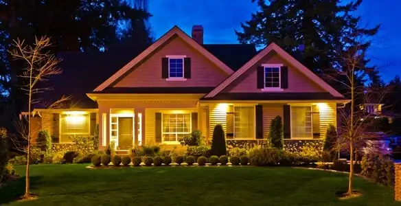 security light installation services illuminating a residential exterior at night in Redding, CA