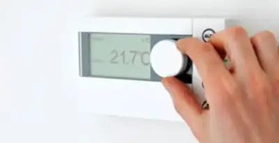 Thermostat installation service with professional adjusting temperature control in Redding, CA