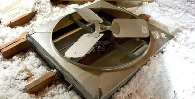 whole house fan installation services with attic-mounted ventilation unit in Redding, CA